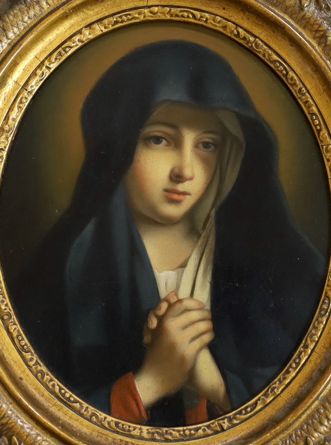 19th century school, oval oil on board, portrait of a nun at prayer, 16cm x 13cm ornate gilt frame
